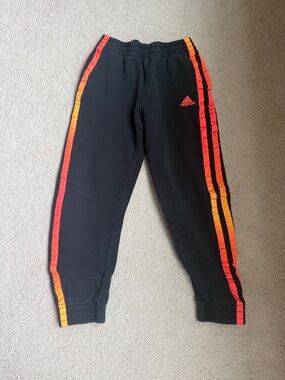 adidas Black Joggers with Red and Orange Gradient Side Stripes